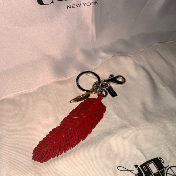 Coach Red Feather Keychain with Gold Charm - Picture 2 of 3